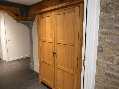 Woodwork project – Bespoke Oak Storage Cabinet Installation in Cobham, Surrey, Cobham, Surrey by KK Construction